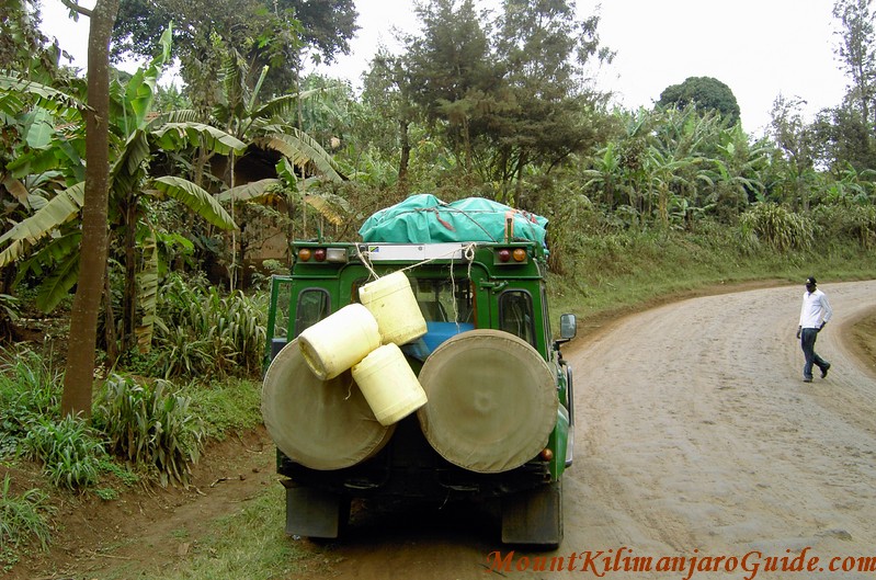 Unsealed road to Machame Gate