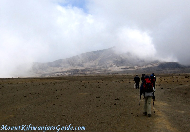 Kilimanjaro climbers making their way across the saddle